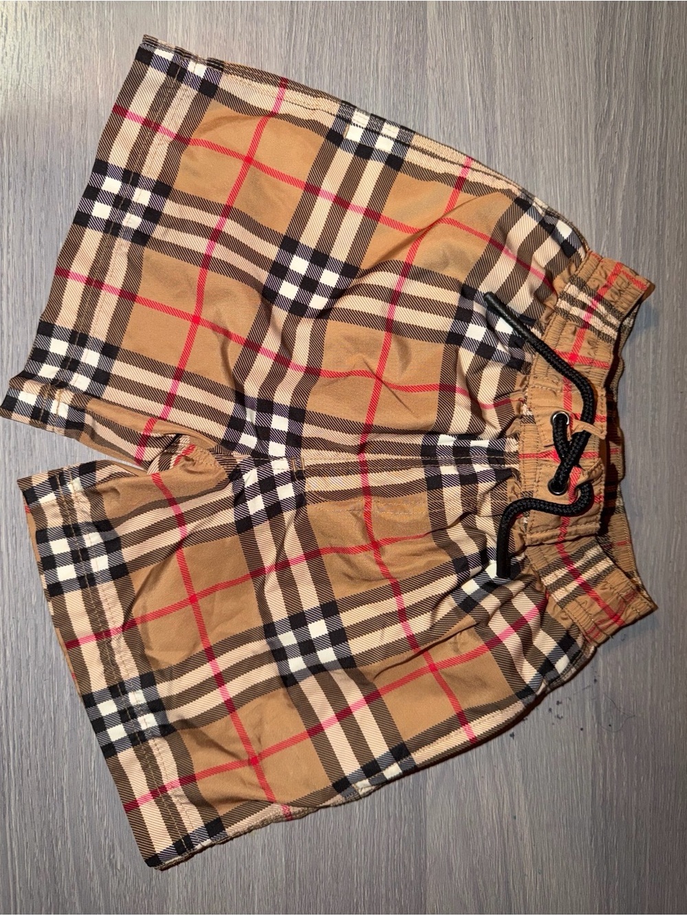 Burberry Kids Tan Plaid Swim Trunks with Red and Black Accents